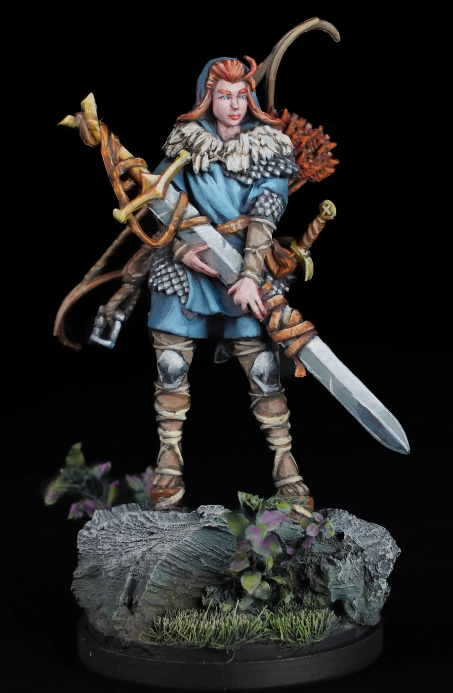 Painted Kingdom Death Screaming God miniature with curved horns, blue glowing vials, severed heads, and scenic base with skulls